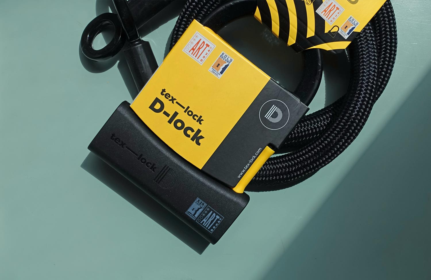 tex-lock D-lock im Test: Leichtes und sicheres Bügelschloss mit flexiblem Textilschloss 1 Texlock D Lock Test Review Leichtes Buegelschluss Fahrrad Verpackung