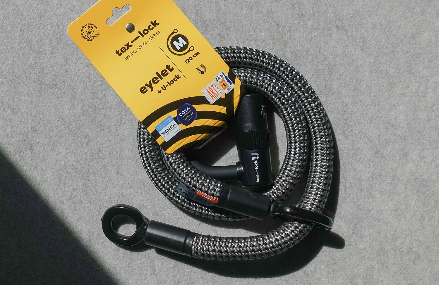 Textiles und flexibles Fahrradschloss im Test: das tex–lock eyelet (2023) 1 texlock test review bike eyelet u lock electric grey packaging 1